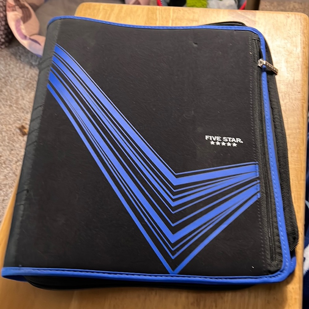Black and blue five star notebook binder. Hardly used. In super great condition
